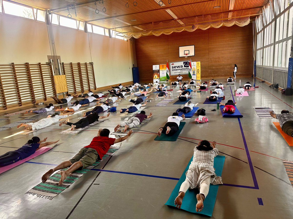IndiainSwiss's tweet photo. An #energising #yoga session by the Embassy, followed by a calming #meditation session led by Heartfulness 🇨🇭, marked the 12th #InternationalDayofYoga2026 celebrations in #Zug.
Organised by @IndiainSwiss in collaboration with SEWA Europe & Heartfulness 🇨🇭, the event brought together the 🇮🇳 diaspora, #yoga enthusiasts & community members in a shared experience of #mindfulness, #wellbeing & #harmony.
A special #yoga session for #children added a joyful touch to the celebrations.
#IDY2026 #YogaforHealthyAgeing #IDY2026inSwitzerland
@MEAIndia @DrSJaishankar @moayush @IndianDiplomacy @PMOIndia