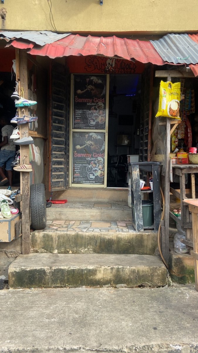 GoldSamuel20's tweet photo. @imSaichowdary_ @grok @grok give me a nice look of this shop with extra entrance sliding door https://t.co/PBG2yi5wog