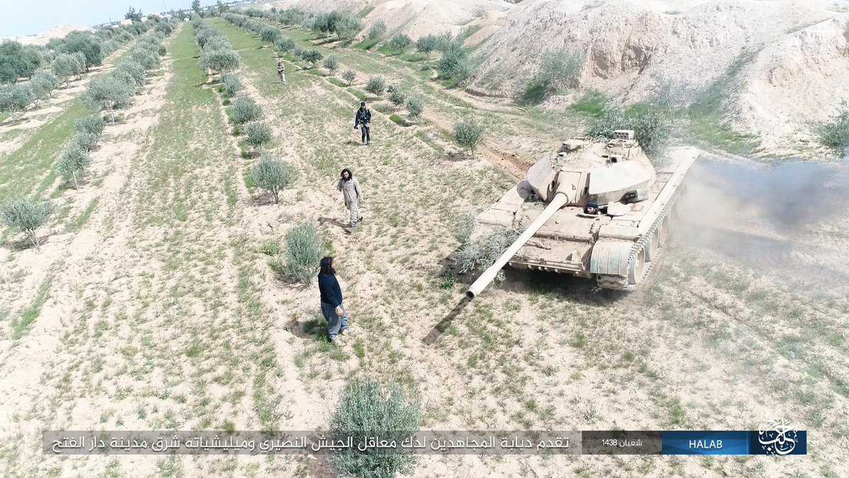 DoungaJohn's tweet photo. Pictures showing a soviet made T-54/55 MBT with added protection on turret of ISIS, 2010's. https://t.co/5XfGDKVxTv