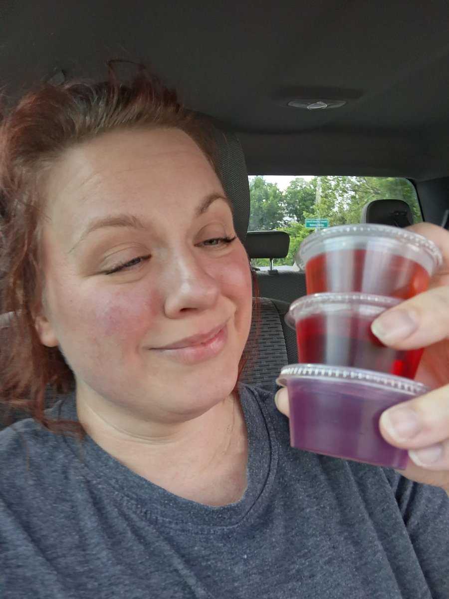 Anthnode08's tweet photo. Is it truly an American redneck gathering until someone hands you 3 jello shots to go through a car window? I'm not driving and these are staying sealed till home. But I ain't mad. https://t.co/gaP7C4pisW