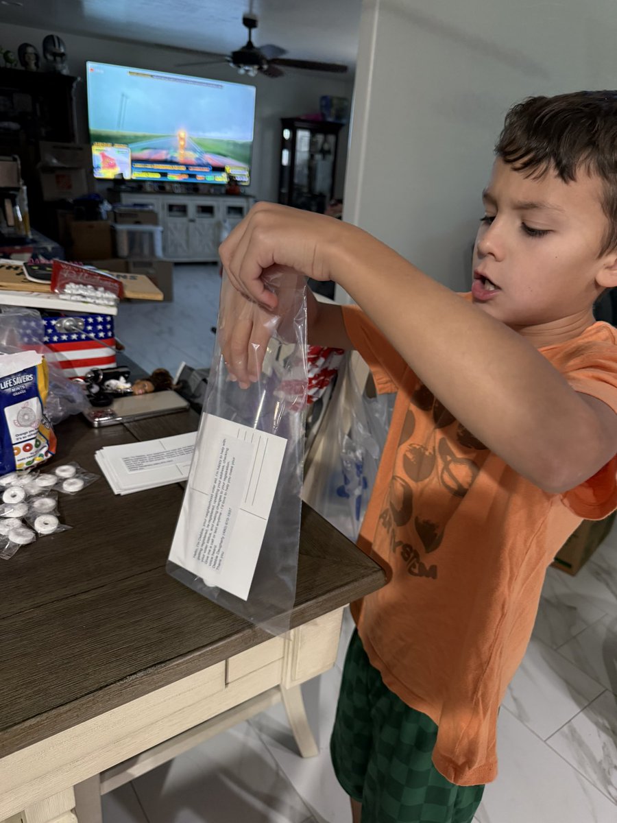 DebDaugherty_'s tweet photo. Got my kiddo to help make postcards &amp; goodie bags for next week’s door knocking. Price of admission: one $20 Roblox card. Deal of the century 😂 @TPAction 
Proud parent vibes! https://t.co/Z3GZXNnmZJ