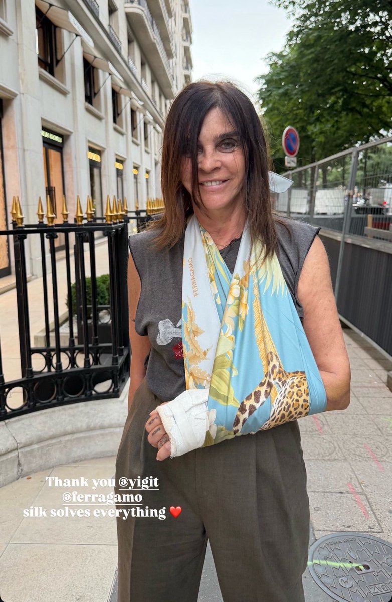 Fashion Editor Carine Roitfeld using her Ferragamo jungle print
