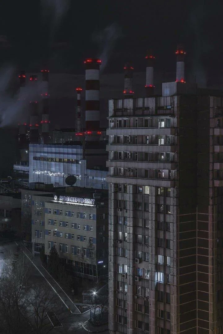 SciFiArchives's tweet photo. A residential area at night against the backdrop of an industrial panorama, Moscow, Russia https://t.co/0SH1j6f7hN