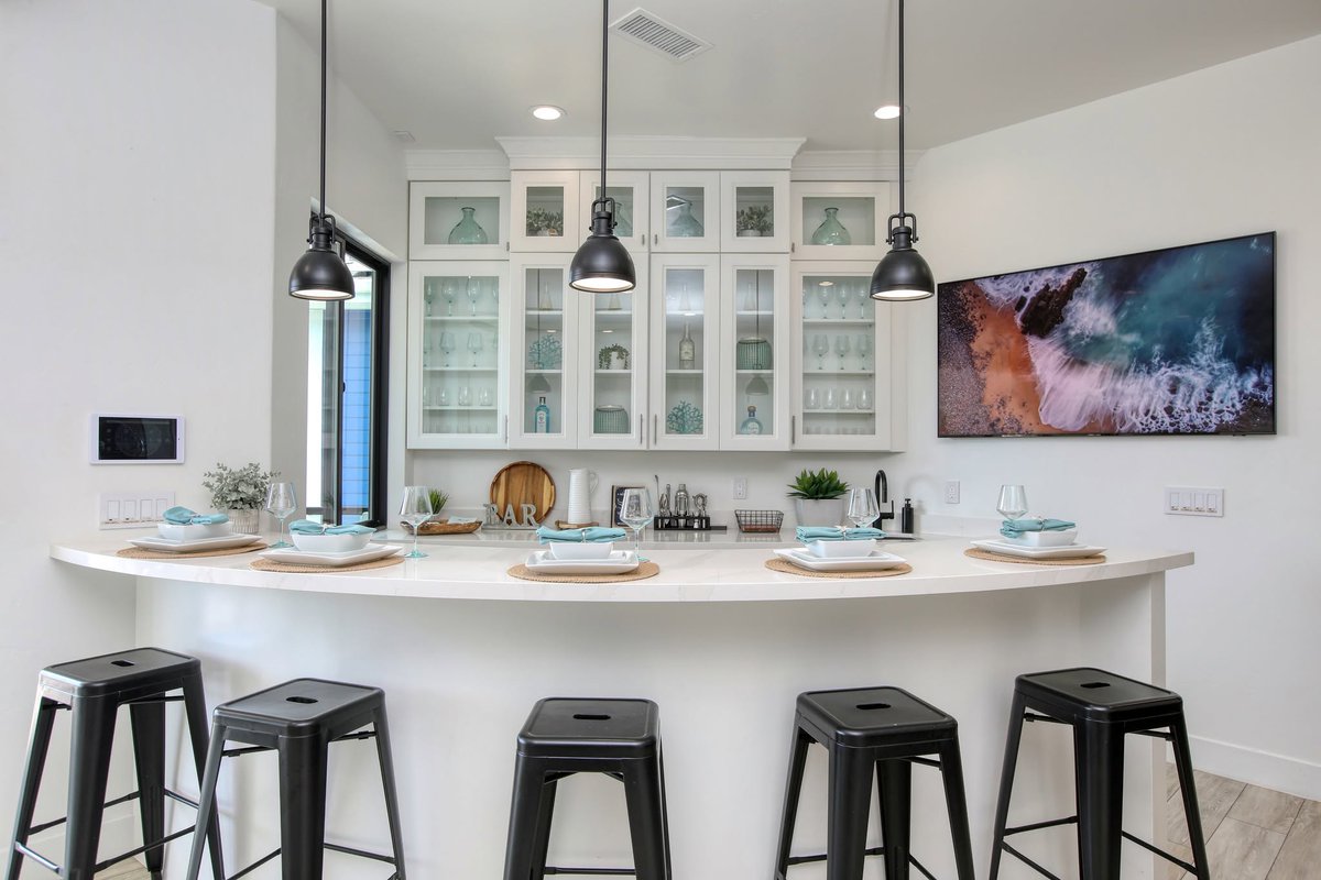 CobbosBH's tweet photo. Who needs a cocktail?  Our Great Room has a full bar next to the kitchen with a pass-through window to the balcony. Bar appliances include a dual wine/beverage refrigerator, ice maker, and a drawer dishwasher.

#airbnb #travel #avilabeach #visitca https://t.co/nq1lqtdk32