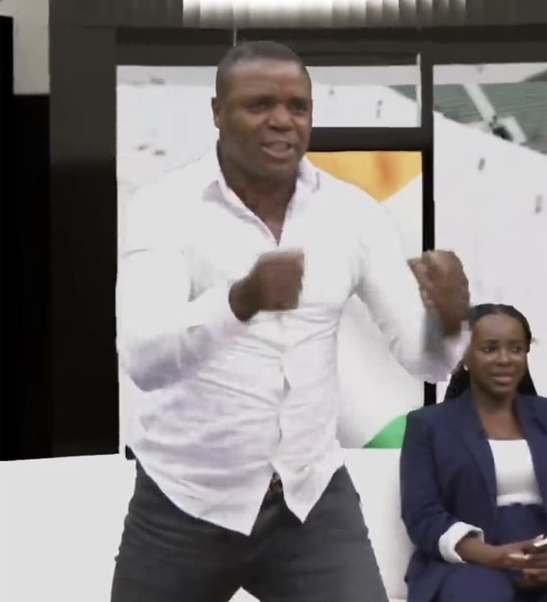 MickyJnr__'s tweet photo. South African legend Aaron Mokoena spotted celebrating Germany’s late goal against Ivory Coast in a dramatic World Cup moment inside the Sporty Studios. 

#FIFAWorldCup 
#WorldCupwithMicky https://t.co/LqU17fPbp0