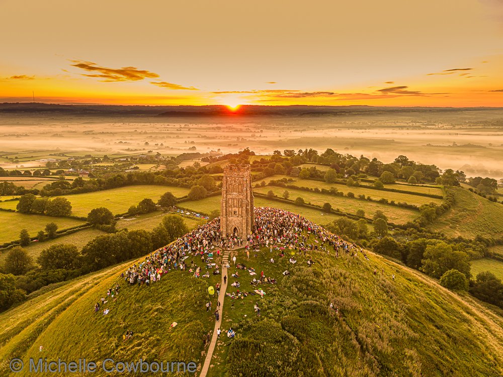 Glastomichelle's tweet photo. Happy Summer solstice from Glastonbury Tor where cheering was heard as the sun came up. It was very busy, very vibrant and a fabulous way to welcome the longest day. I took lots and lots of photos but here is the first one. More to follow later. #summersolstice #summersolstice2026 #glastonbury #glastonburytor