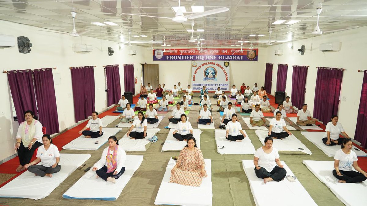 BSF_Gujarat's tweet photo. 𝗕𝗪𝗪𝗔 𝗠𝗲𝗺𝗯𝗲𝗿𝘀 𝗼𝗳 𝗕𝗦𝗙 𝗚𝘂𝗷𝗮𝗿𝗮𝘁 𝗖𝗲𝗹𝗲𝗯𝗿𝗮𝘁𝗲 #𝗜𝗗𝗬𝟮𝟬𝟮𝟲 𝘄𝗶𝘁𝗵 𝗭𝗲𝗮𝗹 & 𝗪𝗲𝗹𝗹𝗻𝗲𝘀𝘀.

Embracing the theme “𝗬𝗼𝗴𝗮 𝗳𝗼𝗿 𝗛𝗲𝗮𝗹𝘁𝗵𝘆 𝗔𝗴𝗲𝗶𝗻𝗴” on #InternationalYogaDay2026, BWWA members of FTR HQ, BSF Gujarat, participated with great enthusiasm in a yoga session held at Ankur Bal Vatika School, BSF Campus, Gandhinagar.

Through various yoga asanas and breathing exercises, the members strengthened the harmony of body, mind, and soul while reaffirming their commitment to physical fitness, mental well-being, self-discipline, and holistic wellness.

#IDY2026
@BSF_India
@BWWA_India