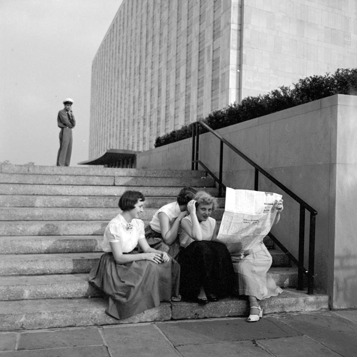 eyeonaxis's tweet photo. Women and newspapers, Vivian Maier https://t.co/Dl2zCOYFYd