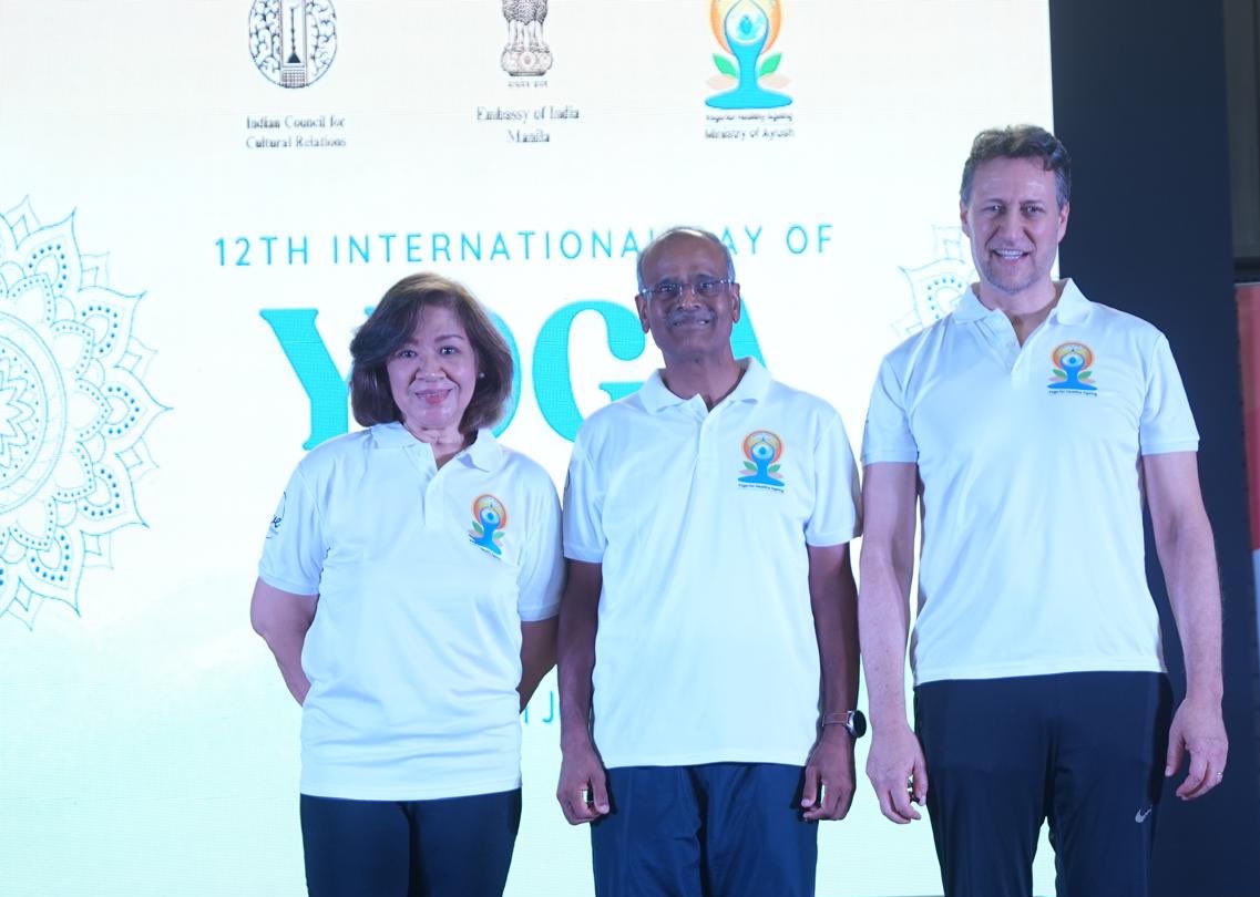 indembmanila's tweet photo. The Embassy celebrated the 12th International Day of Yoga on 21 June 2026 at the Bel-Air Multipurpose Hall in Manila. 

Over 350 yoga practitioners, enthusiasts, and guests attended the IDY celebration and participated in the Common Yoga Protocol session. 

Delivering their remarks on the occasion, H.E. Ambassador Harsh Kumar Jain, H.E. Mr. Arnaud Parel, UN Resident Coordinator in the Philippines, and Dr. Ma. Teresa C. Iñigo, Director General, Philippine Institute of Traditional and Alternative Health Care,  highlighted the importance of  “Yoga for Healthy Ageing,” this year's IDY theme, underscoring the role of yoga in promoting longevity, resilience, and an enhanced quality of life throughout the human lifespan.

A special attraction at this year's celebration were the AYUSH booths set up by Ayurveda clinics in Manila: Sandhi Ayurveda, Shanti Ayurveda, and NaHeal, offering participants valuable insights into the benefits of Ayurveda for healthy living. 
 
The IDY celebration concluded with the special yoga sessions conducted by Brahma Kumaris, NaHeal & Soul Searching, EF Yoga School, and Open Mat Makati.

#InternationalDayOfYoga 
#IDY2026 
#YogaForHealthyAgeing
@MEAIndia
@IndianDiplomacy
@iccr_hq
@moayush
@UNPhilippines