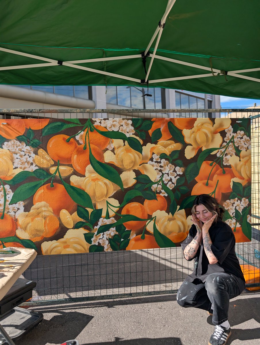 carmiico's tweet photo. I hope you never learn to peel oranges 🙂‍↕️🍊 acrylic &amp; spraypaint on a 4x8 foot board, done live in Guelph over 8 hours! https://t.co/0kXHRAlR7D