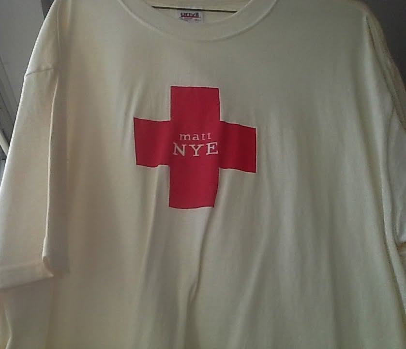 TomDiNardo's tweet photo. This is an #ORIGINAL #MattNye-designed tee shirt. It has been #hanging in my #closet since the 1990s and I've #never #worn it! #Purchasing one of these would be #impossible.

#MattNyeFashions #Designer #TeeShirt #TShirt #White #RedCross #MattNyeClothing #Clothes #VintageCondition https://t.co/k0zXyWbBXq