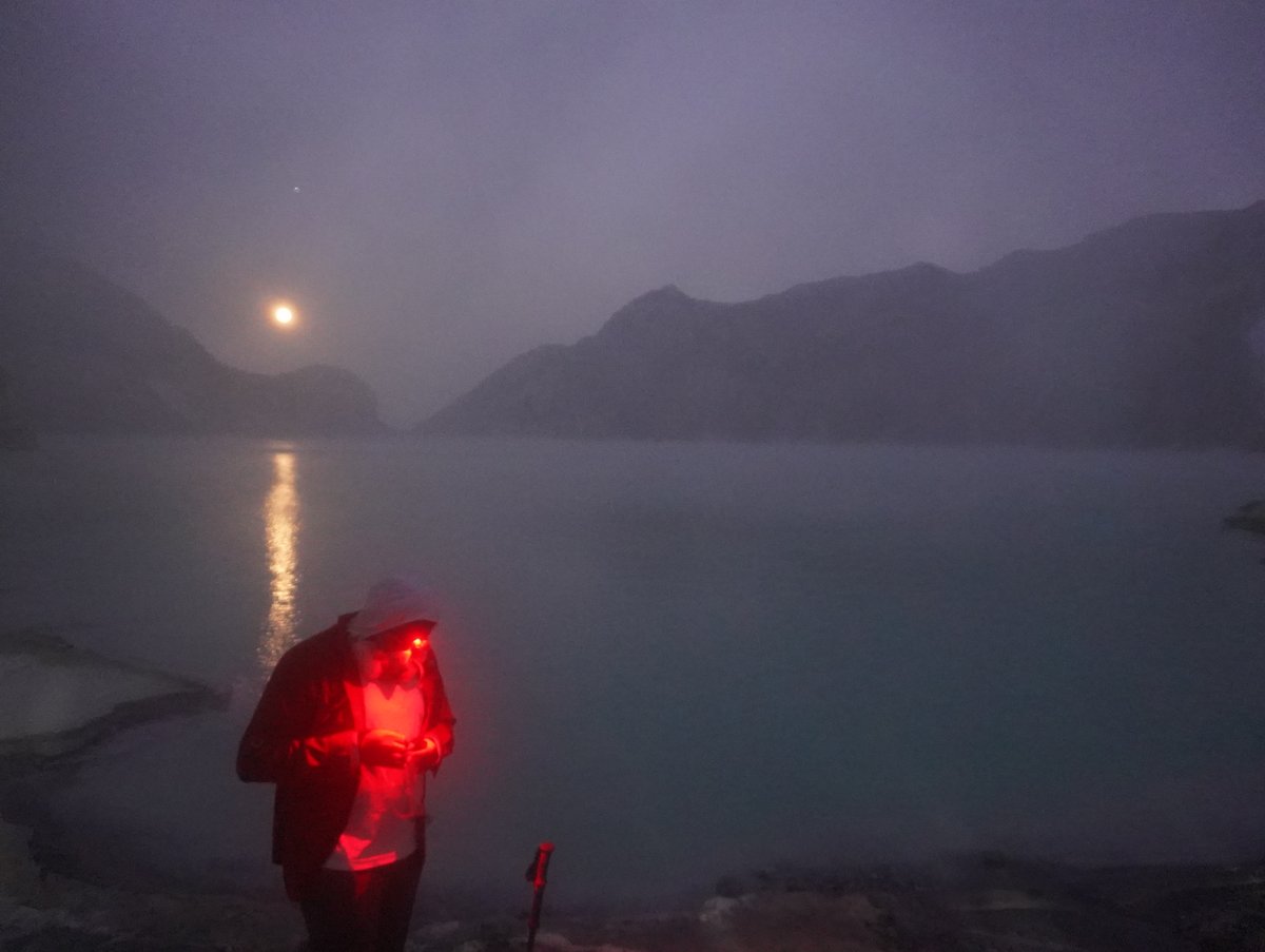 asadtrip's tweet photo. Atop a volcanic lake in Indonesia, sulphuric gases surrounding, lunar eclipse occurring. 2023 Oct https://t.co/9UESctrkLe