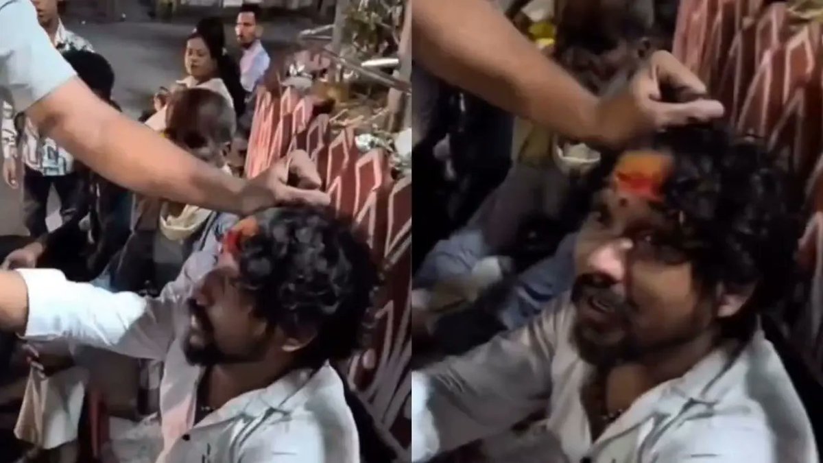 sanjoychakra's tweet photo. Ujjain:  Sarfaraz Shaikh(26), who is a resident of Pimpri, Pune was standing in  queue for the Bhasma Aarti at the Mahakaleshwar Temple in Ujjan, Madhya  Pradesh, along with a Hindu girl.   

He had ‘Mahakal’ written on his forehead, along with chandan (sandalwood) and Tripund (sacred Hindu tilak).   

Bajrang Dal members became suspicious of his identity and checked his Aadhar Card and learnt that the person who was imitating a Hindu  devotee was in fact a Muslim Sarfaraz Shaikh.   

Bajrang Dal activists thrashed him.  
Sarfaraz by doing Al taqyyia had fooled the Hindu girl for #lovejihad. 
From Republic World