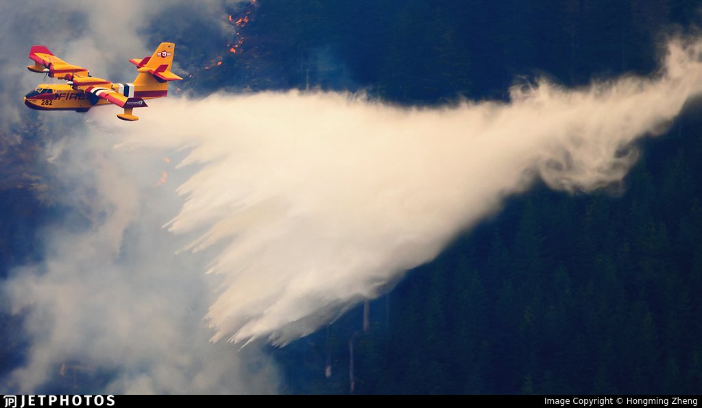 SLCScanner's tweet photo. #IronFire #Update
The fire has grown to 21,935 acres. Bridger Aerospace’s Canadair CL-215T #SuperScoopers are actively conducting aerial fire suppression over the #IronFire near #Eureka, #Utah.

Aircraft visible include:
•  N415BT (Bridger Air Tanker 1)
•  N417BT (Bridger Air Tanker 2)

These amphibious water bombers are a rare but powerful asset in Utah wildfire response. They are currently scooping water from Utah Lake and dropping water on the fire lines. I have never seen these aircraft in Utah before. 

More updates as they become available.