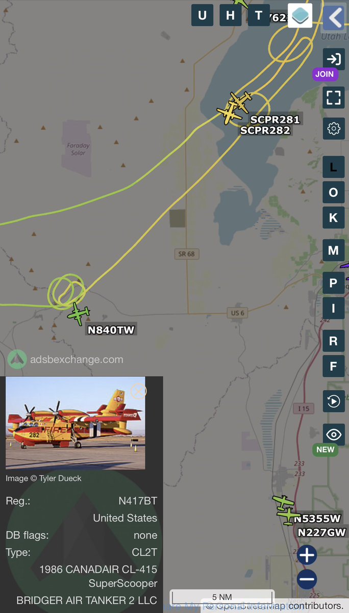 SLCScanner's tweet photo. #IronFire #Update
The fire has grown to 21,935 acres. Bridger Aerospace’s Canadair CL-215T #SuperScoopers are actively conducting aerial fire suppression over the #IronFire near #Eureka, #Utah.

Aircraft visible include:
•  N415BT (Bridger Air Tanker 1)
•  N417BT (Bridger Air Tanker 2)

These amphibious water bombers are a rare but powerful asset in Utah wildfire response. They are currently scooping water from Utah Lake and dropping water on the fire lines. I have never seen these aircraft in Utah before. 

More updates as they become available.