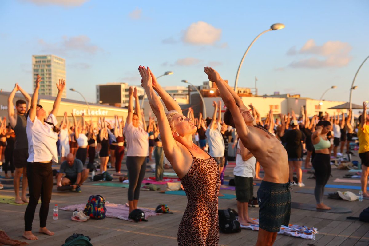 indemtel's tweet photo. Hundreds celebrate 12th #IDY with 108 Surya Namaskaras in Tel Aviv!

Embassy of India, in collaboration with Tel Aviv-Yafo Municipality and Tel Aviv Port marked the 12th International Day of Yoga. 

Hundreds of yoga enthusiasts participated in 108 Sun Salutations. The event featured live Sitar Music of Tavor Ben Dor.
Ambassador JP Singh spoke of the importance and popularity of yoga in Israel and appreciated contribution of @Ellayoga to promoting yoga in Israel. The event concluded with a kathak dance performance by ICCR TIC in Israel, Ms. Pratibha Sharma, and her students. 

#YogaforHealthyAgeing
#Yogaforall
#yogaforlife

Photo credit: Harold Silber @haroldsilber 

מאות משתתפים חגגו בתל אביב את יום היוגה הבינלאומי ה־12 עם תרגול של 108 ברכות שמש!

שגרירות הודו, בשיתוף פעולה עם עיריית תל אביב יפו ונמל תל אביב  ציינו את יום היוגה הבינלאומי ה־12 באירוע חגיגי ומעורר השראה.

מאות חובבי יוגה נטלו חלק בביצוע תרגול  108 ברכות שמש, לצד מופע מוזיקת סיטאר חי של תבור בן דור.

שגריר הודו בישראל מר ג'י פי סינג, הדגיש את חשיבותה של היוגה ואת הפופולריות הגוברת שלה בישראל, והביע את הערכתו לתרומתה של אלהיוגה  לקידום היוגה ברחבי הארץ.

את האירוע חתם מופע מחול קאטאק מרהיב בביצועה של גב' פרטיבה שארמה, נציגת ICCR TIC בישראל, יחד על תלמידותיה.