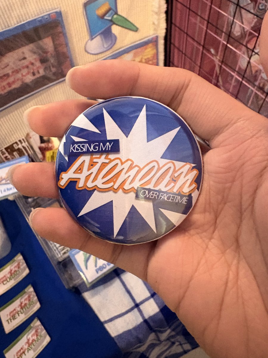 xnxious's tweet photo. I NEED HELPPPPP, I SAW THIS IN CENTRIS KOMIKET PRIDE 2026, I THOUGHT IT LOOKED CUTE SO I TOOK A PIC OF IT AND I WAS PLANNING TO BUY IT LATER BUT I COMPLETELY FORGOT ABOUT IT😭😭😭 WHO IS THE ARTIST BEHIND THIS!!! #komiket #komiketpride https://t.co/hW6ELmeLyc