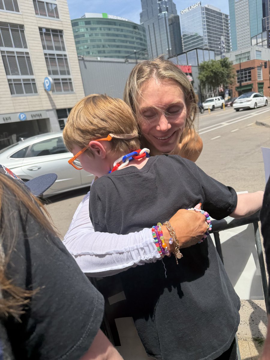 ABBowling96's tweet photo. Just wanted to post and absolutely thank @MsCharlotteWWE for making our children's day at #smackdown in KC this past Friday night! Our daughter made a sign that said "The Crown Belongs To The Queen" and when Charlotte drove in, she saw the sign and made sure to get out and give her the biggest of hugs and tell her how much the sign meant to her. As soon as Charlotte walked away, our daughter had the biggest smile on her face with tears in her eyes because it meant that much to her.  These pictures and those memories will last a lifetime. Thank you to Charlotte who took the time out of her busy schedule to make sure she showed the love to her biggest fans!