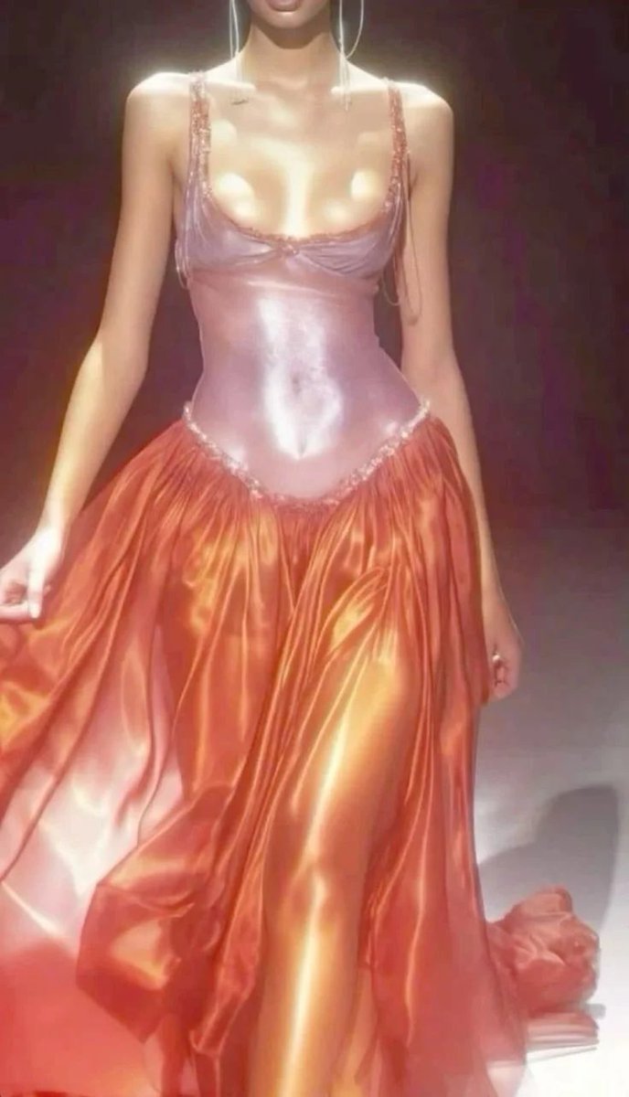LegendaryLade's tweet photo. It appears Yung Miami’s dress was inspired by an AI dress from Pinterest! Thoughts? #BETAwards https://t.co/TOHpXSssyD