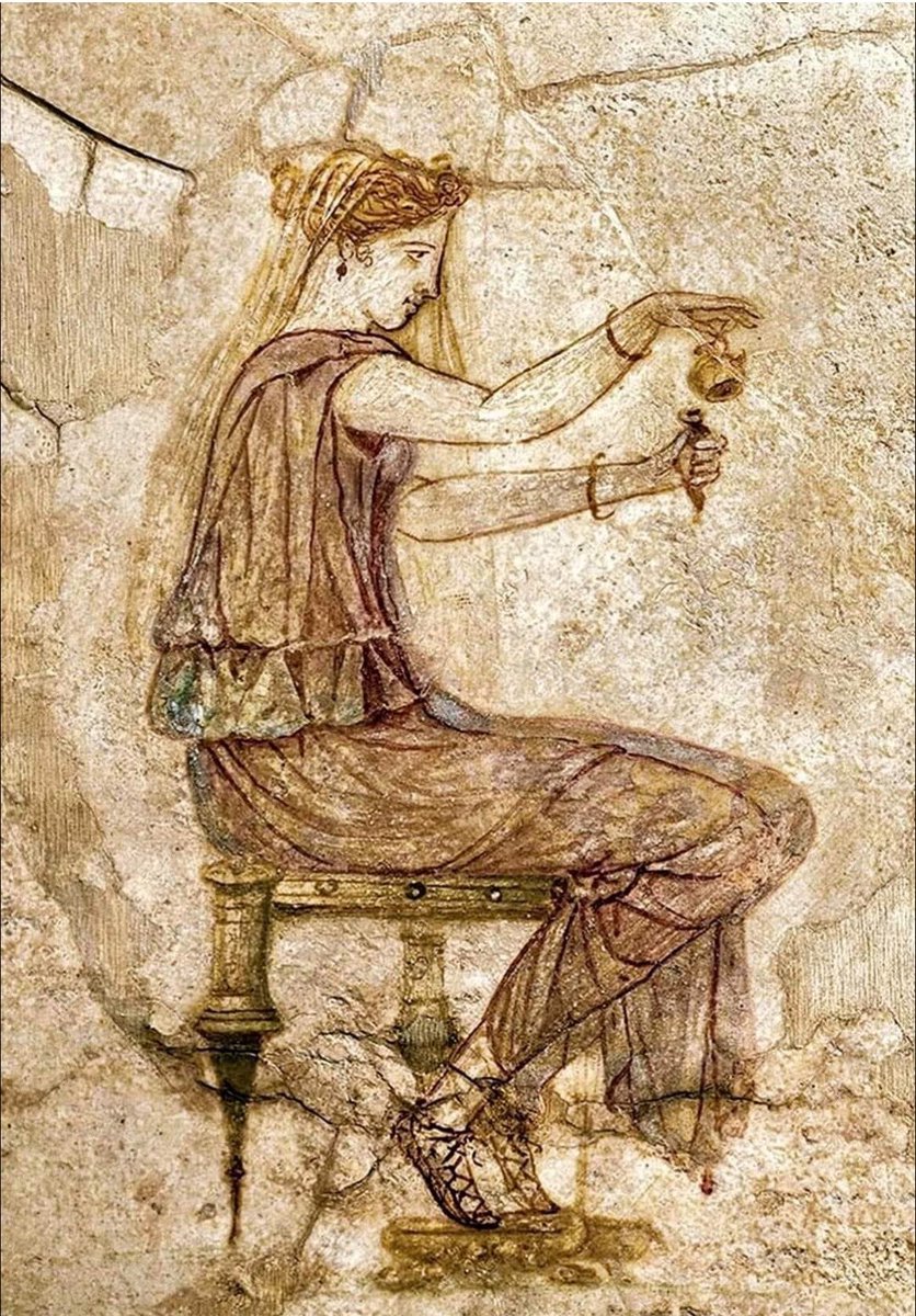 Plantagenet1455's tweet photo. Known as Woman Pouring Perfume into a Phial (or the “Beautiful Perfumer”), this wall painting depicts an elite Roman woman decanting precious scented oil from aryballos into a slender phial. It reflects the importance of cosmetics, grooming, and fragrance in Roman elite life. https://t.co/yvUNliSmq5