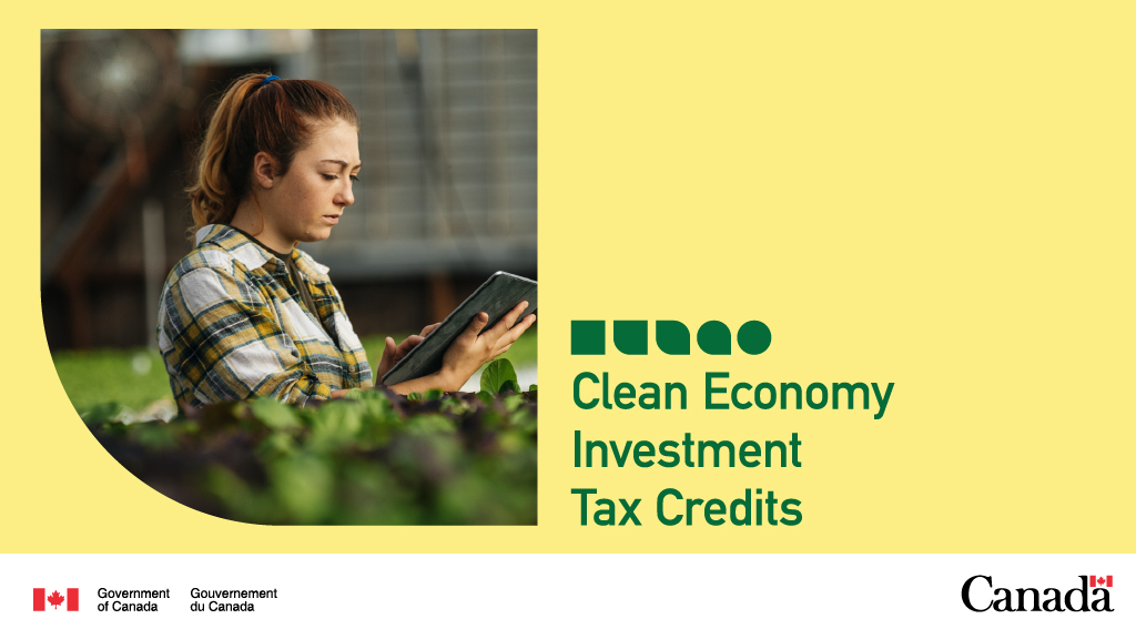 A person works on a tablet. The text reads, “Clean Economy Investment Tax Credits”