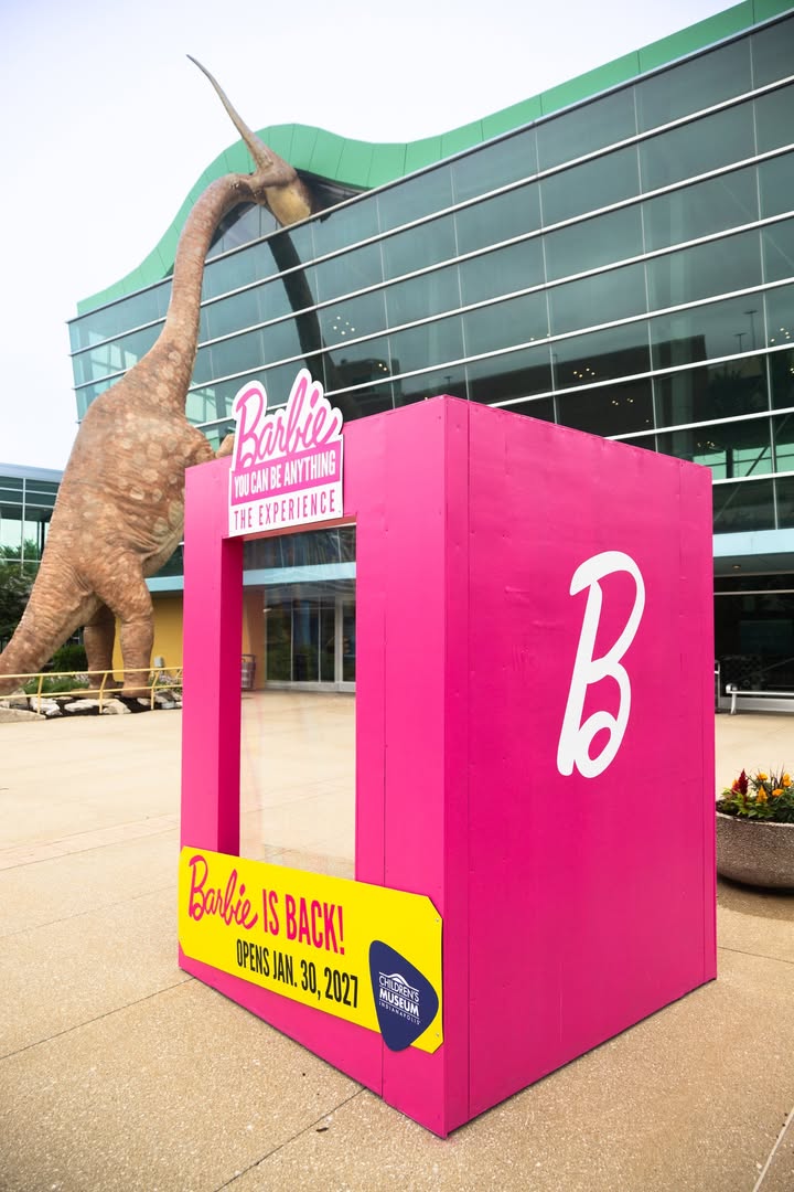 TCMIndy's tweet photo. We built a Barbie Box to celebrate the return of Barbie You Can Be Anything: The Experience! Step inside, strike a pose, &amp; get excited for the exhibit's return on Jan. 30, 2027. Buy a membership &amp; get a year full of fun plus this exhibit. Learn more: https://t.co/6ItTm30jcr https://t.co/2kgOYX1joO