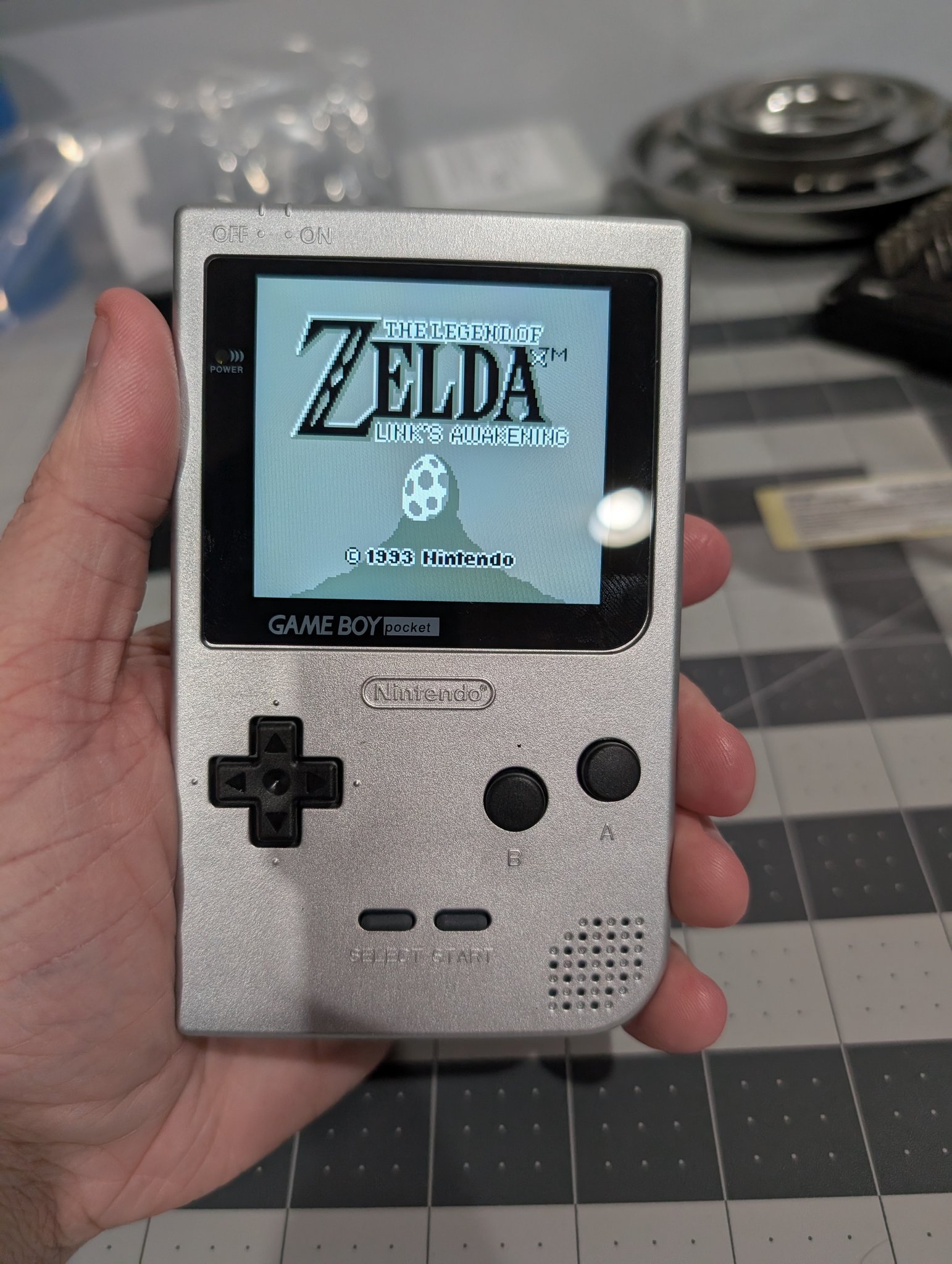 The Game Boy Pocket was annoying. Soldering the wires for controlling the on screen display was torture. But it works now. And looks rad. https://t.co/ZqhuO725cv