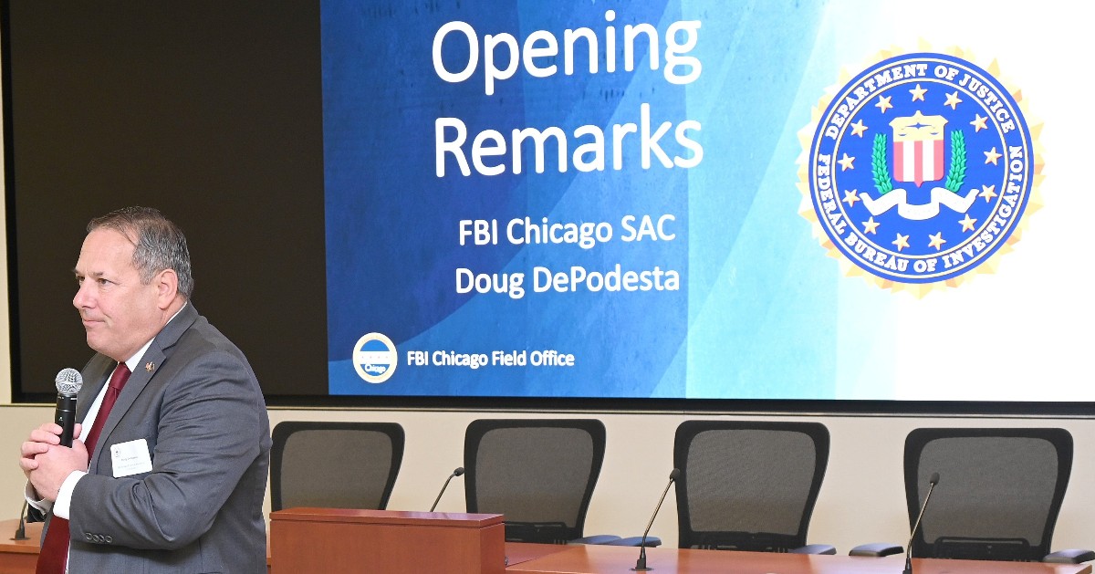 FBI Chicago SAC Doug DePodesta delivering opening remarks during the 2026 Financial Analytic Exchange.