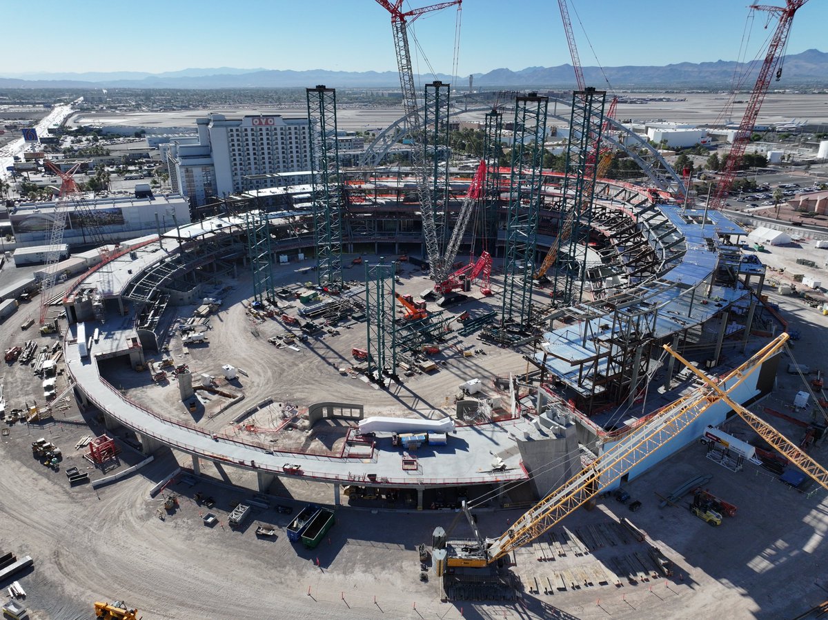 seventensuited's tweet photo. Las Vegas A's ballpark update from the air.

Here are some new shots showing the first of five roof trusses along with some other progress since the last update.

I tried to fly last weekend but it was too windy to fly safely.

If you zoom in, you can start to see concrete sections that form the stadium seating.

Also, you can see the second truss about to be put together in the first photo.