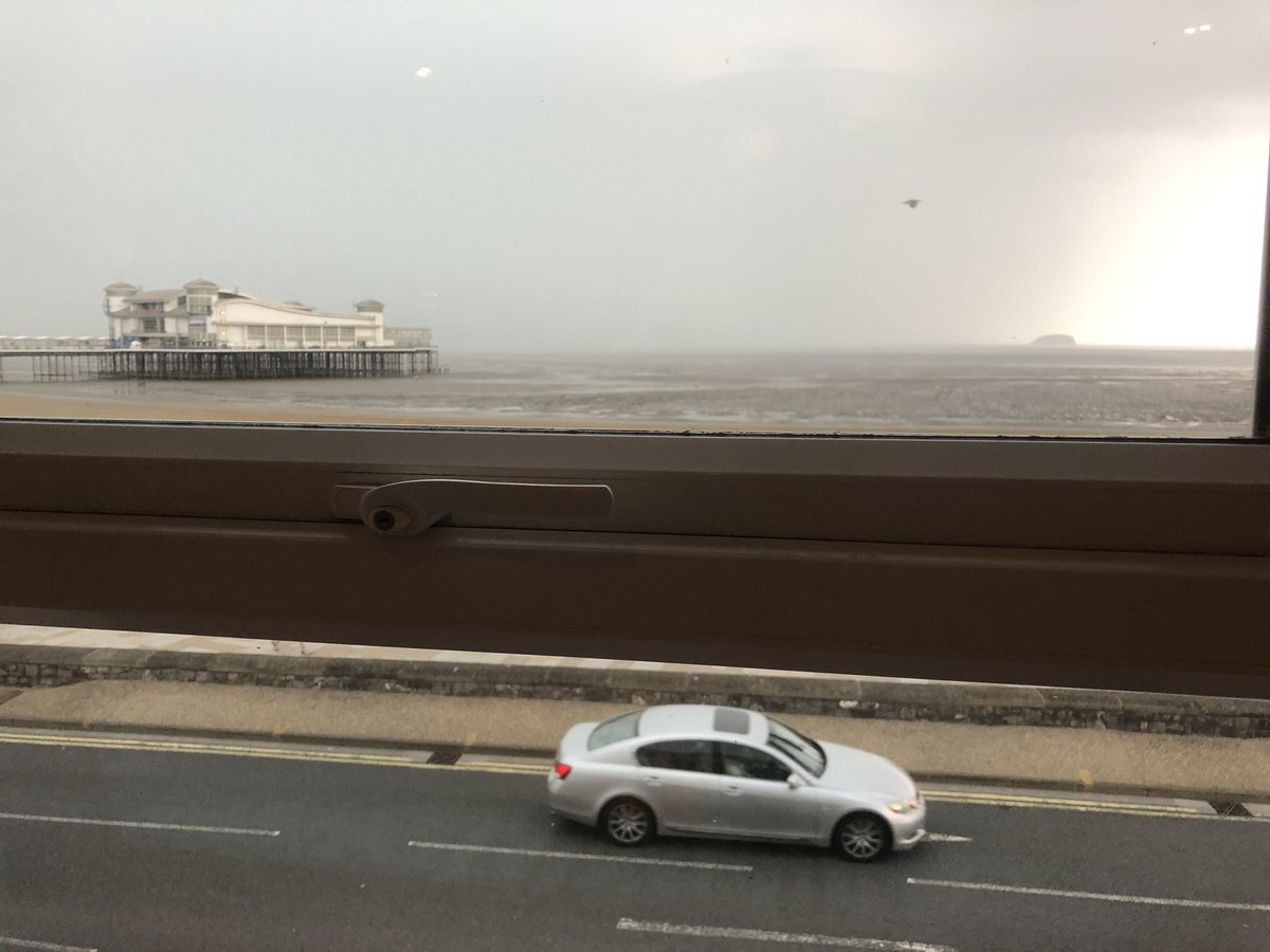 WBA1957's tweet photo. “It’s 38 in the shade here so I stayed in the sun” Who said that? Looks like we’re about to have a storm here, it’s gone pretty dark suddenly. Best stay here and have another £3.35 Stella. Thanks Tim. https://t.co/VGuc6Tfocl