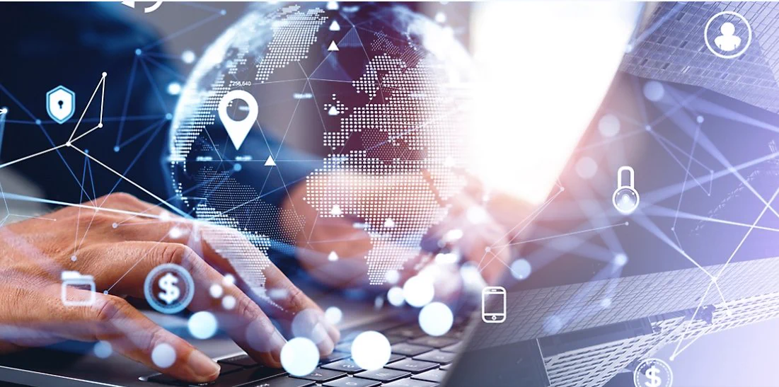 Close-up of hands typing on a laptop keyboard with a partially visible globe overlayed. Various icons like locks, location pins, dollar signs, and devices are scattered around, suggesting themes of technology and global connectivity.