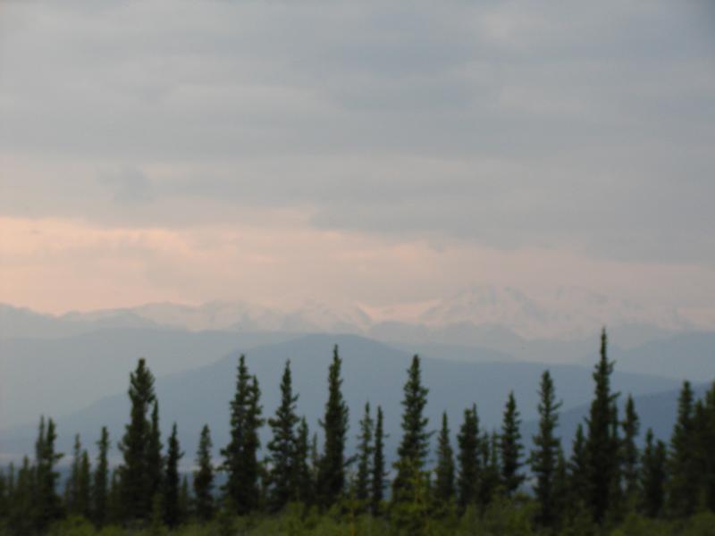 JimTeresco's tweet photo. 6/22/2001: Tok to Whitehorse was our only significant backtracking west of Chicago, so we have fewer pictures from this day.  We stopped for a break at an overlook of the Kluane Icefield Ranges, where it was unfortunately pretty cloudy.  #AlaskaPlus25 https://t.co/HHPnS17dE8