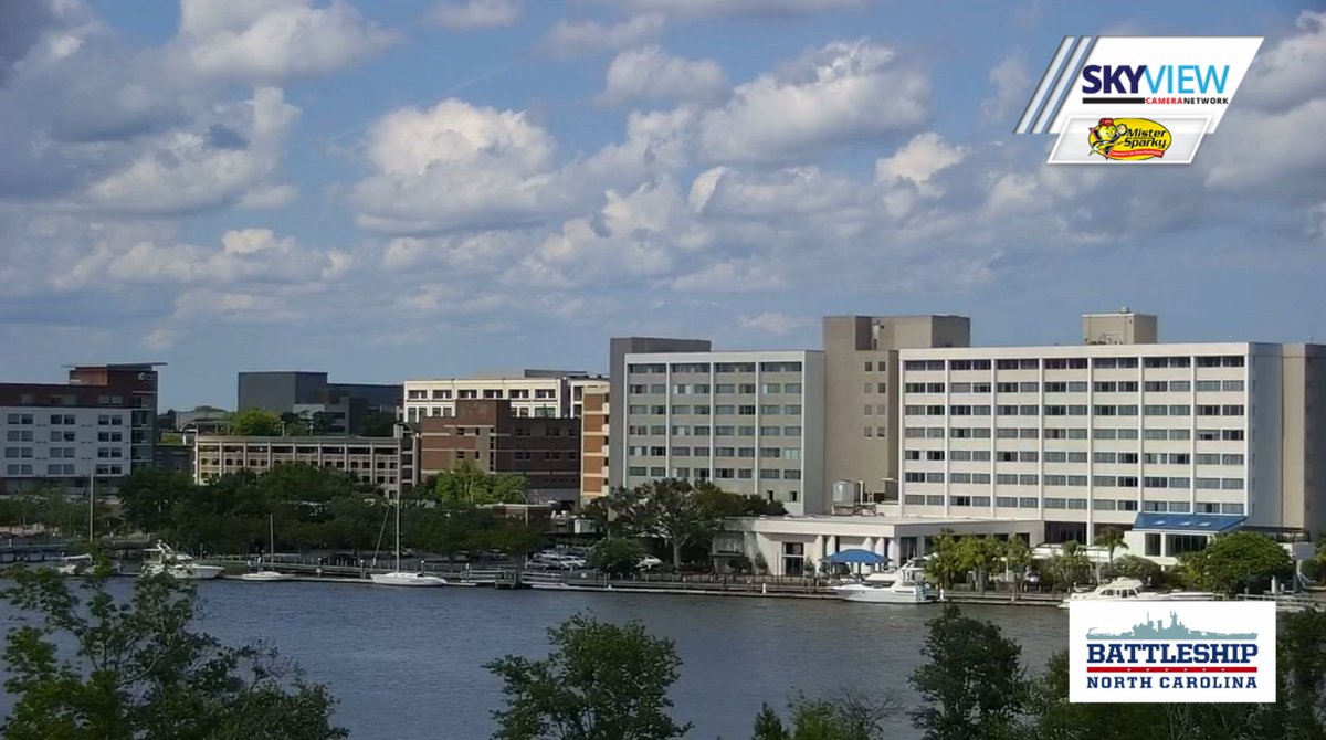 LeeHaywoodWX's tweet photo. Monday afternoon view from the Battleship North Carolina into #WilmingtonNC is a good one! #WWAY #NCwx https://t.co/2QRtaAP8Ee