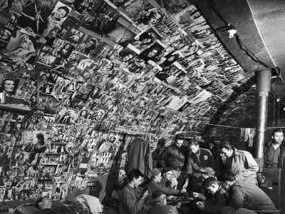 Jonathan_Trenn's tweet photo. @JonahDispatch Years later, I found this photo of him in an old Time Life book on WWII. He's on the extreme lower right and they are in a Quonset hut in the Aluetians. https://t.co/TzQEKUu5VS