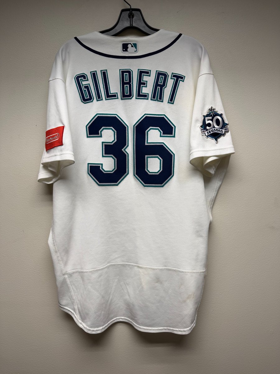 SEAauthentics's tweet photo. Our latest auction is live! This week's auction includes game used items from Colt Emerson, JP Crawford, and Logan Gilbert, plus caps from our Randy Johnson Number Retirement celebration. Place your bids at https://t.co/3F9dPglkVL before 7pm on Sunday! https://t.co/nbuKb1BuZ9
