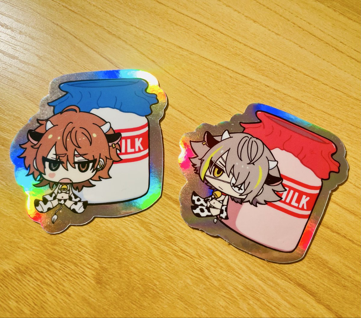 podanono's tweet photo. あにょ……去年作ったこの牛柄ビキニステッカーがまだありえん数残ってるんですが凪琉オンリーでりゅいだけ置いても許されますか(ンガさんは置きません‼️) オーロラホロなのでありえんギラギラで可愛いです一応　りゅいはいちごミルクです https://t.co/XZvQIxCN5v