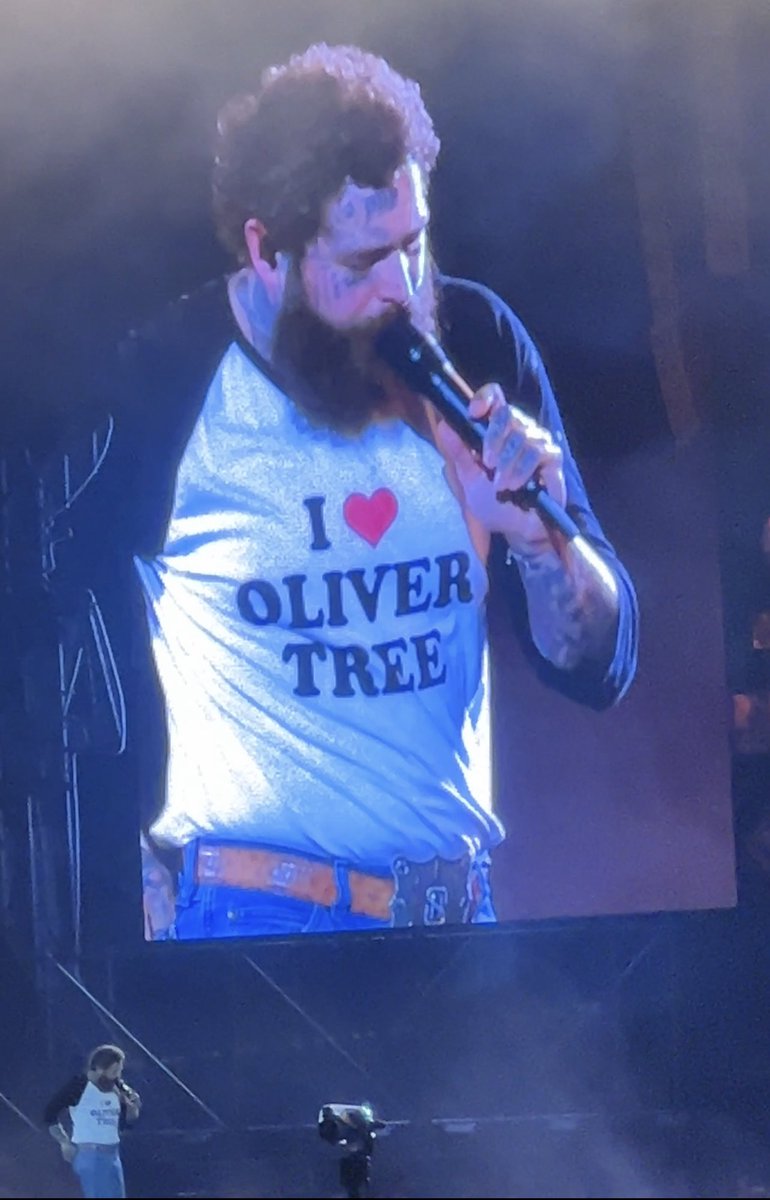 BMackeySports's tweet photo. Post Malone in Connecticut tonight wearing an Oliver Tree shirt while performing in the pouring rain. #PostMalone #OliverTree #Connecticut #RIPOliverTree #UConn https://t.co/mhyE5wM1mB