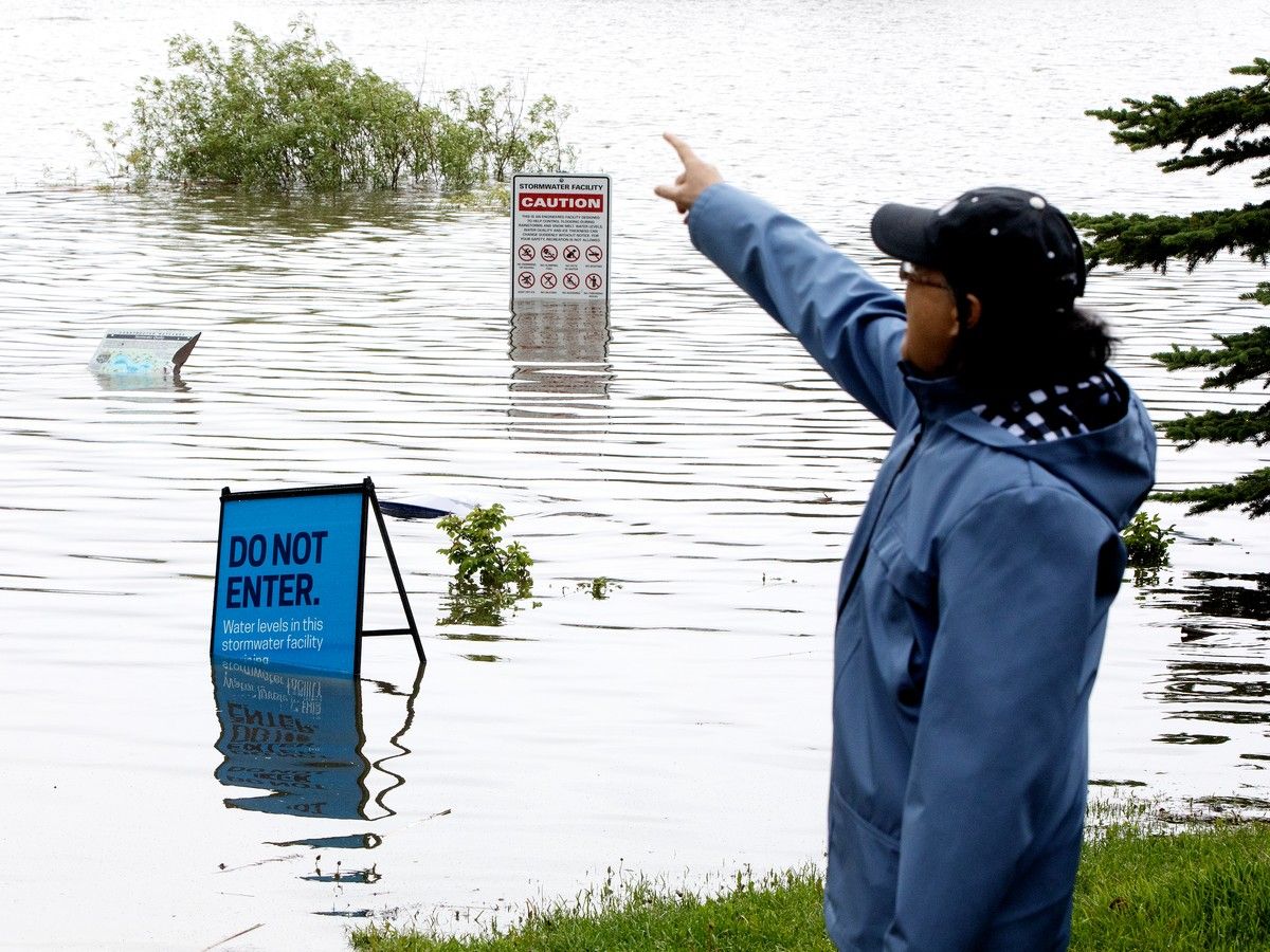 edmontonjournal's tweet photo. Heavy rain forces Epcor to continue warnings, people told to stay away from river, storm ponds https://t.co/p7bQCFk9yM https://t.co/m0Pa0tYt7J
