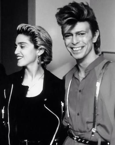 MadonnaLiteral1's tweet photo. Madonna sobre se inspirar em David Bowie em entrevista para a Interview Magazine:

Ele sempre dizia coisas como: “Não tente agradar a plateia”, ou: “Quando você está em águas profundas, com os pés mal tocando o chão e acha que vai se afogar, então está exatamente no lugar certo.” Isso causou uma enorme impressão em mim. Meu Deus, não existia ninguém como ele. A forma como expressava sua feminilidade, seu senso de estilo, seu conhecimento sobre arte e espiritualidade. Ele era profundamente musical, sensível e genuinamente não se importava, da maneira mais inteligente possível. A garota que dança “Big Spender”, ou a garota de Confessions on a Dance Floor, é a garota que canaliza essa energia. Vou fazer exatamente o que eu quiser.