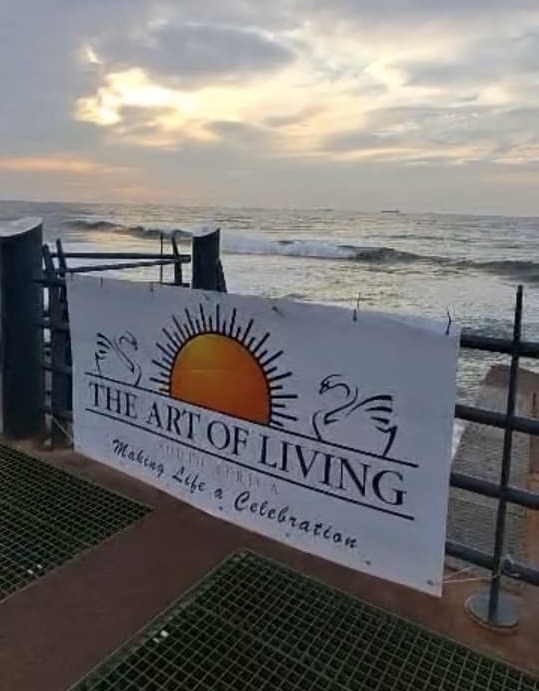 srisriyogaSA's tweet photo. Rising and shining at the International Day of Yoga event in Durban at the Whalebone pier, Umhlanga. Well done Dr Kalay and team. https://t.co/WUKMfeCFdB
