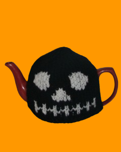 TeaCosyFolk's tweet photo. The Black Skull Tea Cosy is a bold, gothic character knit with striking detail and attitude. See the cosy here: https://t.co/TiMNUObb4e   #knit #TeaCosyFolk #KnittingPattern #teacosy #BlackSkull https://t.co/toMdogmJqK