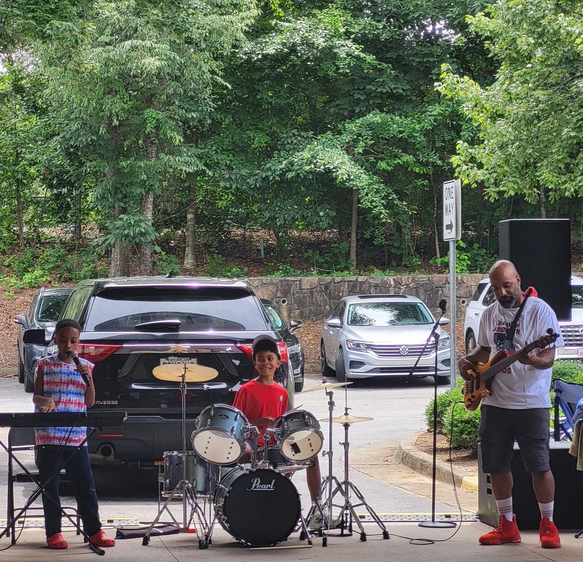 CraftAndConvo's tweet photo. In hindsight, I think it was. And I'm working on getting more pictures. But this one is my favorite. Me, my son, and my music nephew performing live for the first time under our  band name, Grady Curve.. https://t.co/7k2MUOpZEd