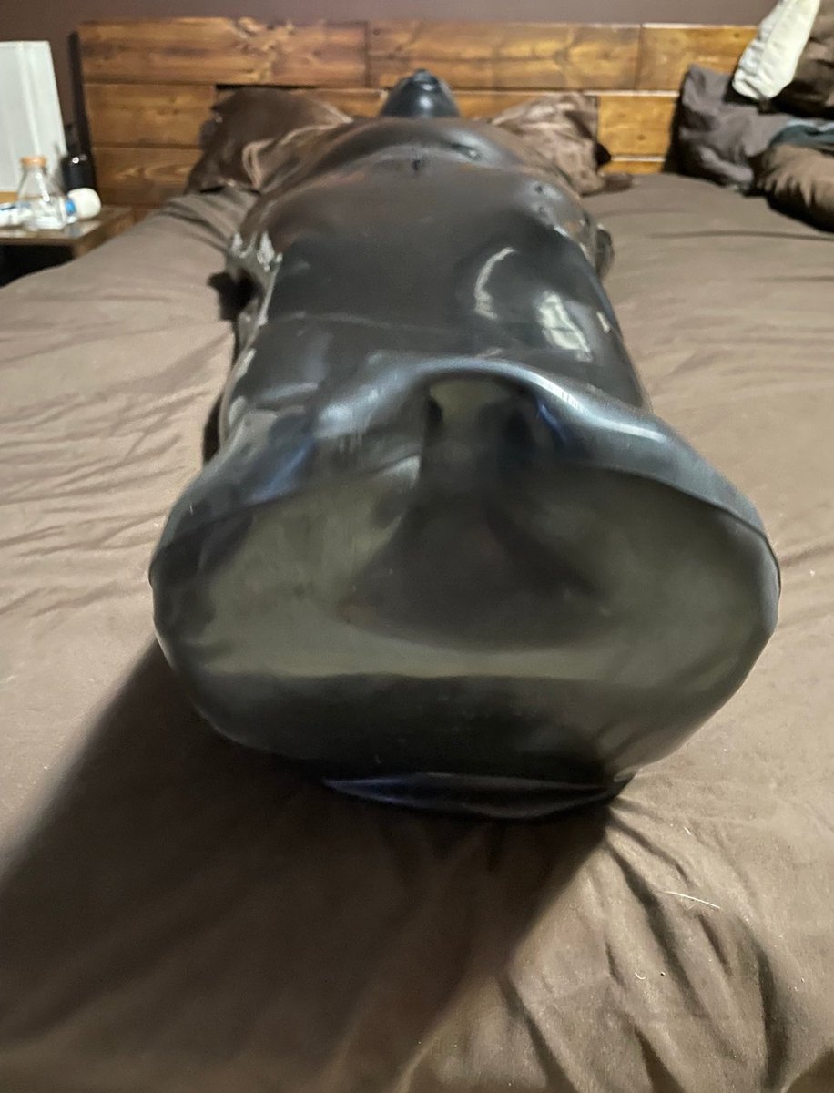 buchan48661's tweet photo. How would you like to spend some time in my thick rubber KinkProjects sleepsack and silicone balloon hood. There's a vibrating cock sheath and massive butt plug and the hood's mouth tube. If you want to feel completely consumed by rubber and all you can do is moan, send me a PM. https://t.co/JjfXH1Ghix