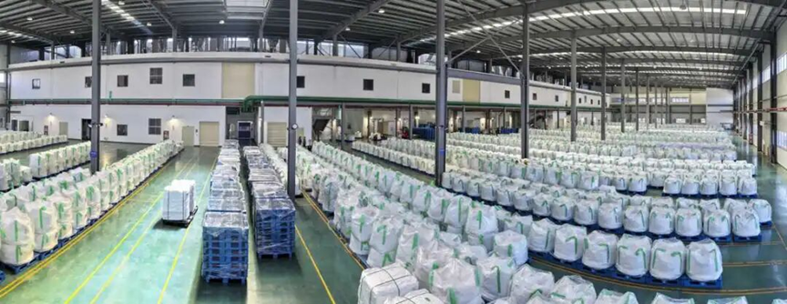 ChinaScience's tweet photo. Recycling process: transforming black mass into battery materials

Industry projections indicate that China generated nearly 400,000 tons of end-of-life electric vehicle (EV) power batteries in 2025, with that volume expected to surpass 1 million tons by 2030.
 
What happens to these batteries once they reach end-of-life? A recent visit by People's Daily reporters offers a closer look.

Trucks laden with retired EV batteries arrive daily at an integrated circular economy industrial park managed by Brunp Recycling, a holding subsidiary of Chinese battery giant CATL. Located in the Yichang Hi-tech Industrial Development Zone in Yichang, central China's Hubei province, this is where these batteries begin a new journey through the recycling chain.

"Upon arrival, retired batteries are sorted and stored according to their models, conditions, and sources," said Chen Zhaozhe, production manager at Yichang Brunp Recycling Technology Co., Ltd. The company recycles more than 150,000 tons of power batteries annually.

Inside the storage area, rows of battery packs were neatly stacked. "All these power batteries have degraded to less than 80 percent health," Chen noted. "They suffer slower charging speeds, reduced driving range, diminished power output, and elevated risks of thermal runaway."

Historically, gaps in battery management sometimes allowed end-of-life batteries to re-enter the market. Others ended up in unauthorized workshops with inadequate facilities and recycling technologies, posing significant safety and environmental risks.

To address these issues, China launched a national traceability information platform for new energy vehicle power batteries on March 31 this year. Every battery is now required to have its digital identification number recorded throughout its entire lifecycle from manufacturing and vehicle installation to operation, maintenance, retirement, and recycling.

"This not only helps ensure that we follow standardized procedures, but also allows vehicle owners to track where their batteries ultimately go," Chen said. "That increases their willingness to sell retired batteries to authorized recyclers."

The company has established a comprehensive traceability system that tracks every stage of the recycling process, from incoming materials and production procedures to final product shipments.

Once a battery's digital identity is verified, the retired pack moves to an automated dismantling line. Robotic arms skillfully remove the outer casing, revealing densely packed, brick-sized battery cells inside.

These cells, still potentially unstable, undergo a complete discharge process first to reduce their voltage to safe levels.

Following discharge, the cells are processed in crushing equipment, breaking them into uniformly sized fragments. The resulting mixture enters a nitrogen-protected furnace for high-temperature pyrolysis. Subsequent procedures, including dispersion, screening, and sorting, separate constituent materials such as casings, copper, and aluminum.

"Some of these separated materials can be reused directly," said Wang Hao, technical director at Yichang Brunp Recycling Technology Co., Ltd. "What remains is a high-purity black powder known as black mass."

This "black mass" is the most valuable material recovered from the cell, containing concentrated quantities of high-value elements such as lithium, nickel, cobalt, and manganese -- the critical raw materials for future batteries.

In the hydrometallurgical workshop, the black mass is fed into enormous reaction tanks and mixed with specially formulated acidic solutions. Under carefully controlled conditions, an intense chemical reaction takes place. The solid black mass dissolves completely, and its metal elements enter the solution in ionic form, creating a complex "metal soup."

For years, a major challenge in the industry was efficiently and accurately separating and purifying individual metals from this intricate mixture. 

"Traditional recycling methods often suffered from low recovery rates, poor product purity, high energy consumption, and the generation of large amounts of difficult-to-treat waste residue," Wang said.

To overcome these limitations, the company developed a direct recycling technology. Using this process, the combined recovery rate for nickel, cobalt, and manganese reaches 99.6 percent, while lithium recovery reaches 96.5 percent.

After passing through multiple processing stages, the dissolved black mass is ultimately transformed into high-purity lithium carbonate and iron phosphate. These newly regenerated raw materials can then be transported directly via pipelines or short-distance logistics to nearby downstream battery manufacturing facilities located just across the road.

"The iron phosphate and lithium carbonate supplied by Brunp Recycling are precisely blended and processed to manufacture new high high-performance lithium iron phosphate cathode materials," said Shi Jiang, head of the cathode materials division at another company under Brunp Recycling.

Compared with battery materials produced from newly mined ores, the next-generation lithium iron phosphate batteries made with recycled materials deliver outstanding performance.

"EVs equipped with these batteries offer faster charging speeds and longer driving ranges," Shi said. "They are better able to meet market demand for fast charging, extended range, and greener, lower-carbon transportation."

The full regeneration cycle from discarded battery pack to new raw cathode materials takes just a week.

In recent years, the industrial park has also established a closed-loop system of reverse product design. Lessons learned from the recycling process are fed back to battery manufacturers, helping them design batteries that are easier to recycle.

"For example, we recommend optimizing battery pack structures so they can be dismantled more easily through automated processes after retirement," Chen explained. "We also suggest adjusting the composition of certain metal materials so they can be separated and purified more efficiently during future recycling." (By Wu Jun, People's Daily)