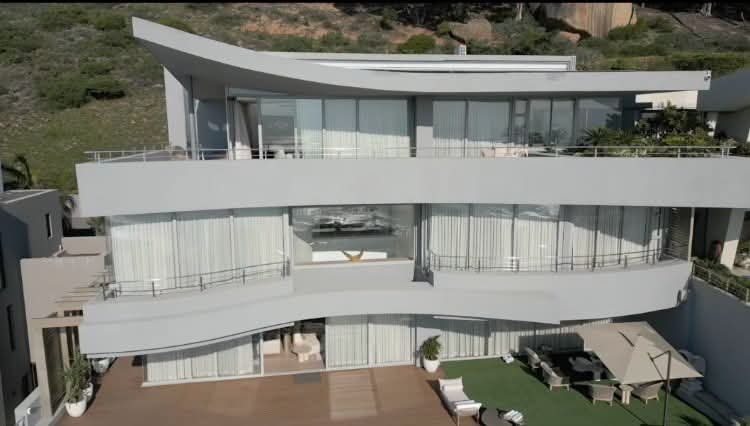SirWicknellFans's tweet photo. We were WELCOMED to our new HOME IN CLIFTON / CAPETOWN last weekend...A cool 160 MILLION RAND in total WELL SPENT including everything done and delivered with untmost CLASS and attention to detail...💰💸💷💵💴...GOD IS THE GREATEST...🙏🙏🙏...THANK YOU MR STEPHEN PELERADE and your entire staff at PELERADE DESIGN HOUSE. YOU ARE THE BEST THERE IS IN THE BUSINESS but as we celebrate this new beautiful home we continue to miss and pray that MAY OUR BELOVED ASHLEIGH'S BEAUTIFUL AND DEAR SOUL CONTINUE TO REST IN ETERNAL PEACE...
❤️❤️❤️🙏🙏🙏

As advertised - 

On top of the world - If nothing but the best will do!

A Masterpiece of Design and Craftsmanship
This architectural gem by SAOTA is a testament to meticulous attention to detail and the finest materials, offering unparalleled luxury in a prime Clifton. From its commanding position bordering the Table Mountain Nature Reserve, this home boasts panoramic views across Table Bay and Robben Island, setting the stage for an extraordinary lifestyle. Sophisticated Interior & Seamless Flow. The home's minimalist yet inviting design celebrates craftsmanship, featuring solid French Oak Oggie wide-plank flooring, Duram-painted walls, and a grand front door crafted from Murba wood. Inside, the entrance showcases matching Murba cladding, exuding timeless elegance. An open-plan layout blurs the line between indoor and outdoor living, with expansive Dix aluminium doors leading to a Norwegian pine pool deck and low-maintenance Gaapa outdoor flooring slats. Recycled glass light fittings and Duravit basins and baths add contemporary sophistication, while Hansgrohe taps and fittings ensure the highest standard of quality.
Ultimate Kitchen & Entertaining Spaces
The Eurocasa kitchen, designed for the discerning chef, includes top-tier finishes and a separate scullery for effortless entertaining. Ceramic tiles complement the design, creating a seamless space for alfresco dining overlooking Cape Town's iconic landscape.
Exclusive Penthouse Retreat
The master suite is a private haven, featuring:
A living area with floor-to-ceiling views
A luxurious dressing room framed by mountain vistas
An indulgent bathroom set within an indigenous garden
A private deck for moments of tranquility
Thoughtful Family Living
Three additional en-suite bedrooms on the middle level boast uninterrupted views, complemented by a pajama lounge and serene courtyard garden.
Unmatched Features & Amenities
Linen room: Cedarwood shelving for added luxury
Lower entertainment level: Gym, games area, designed for a home theatre, and storage
Premium finishes: French light switches, solid wooden doors, and electrical underfloor heating throughout
Elevator: Kone lift for all 4 floors
Space deigned for a Wine cellar: A must for the connoisseur
Exterior Excellence
The home's exterior features Marmoran paint, harmonizing durability with modern aesthetics, while Norwegian pine and Garapa slats accentuate its outdoor appeal.
Details
4 Bedrooms | 5.5 Bathrooms | 2 Garages
This is more than a home—it's a masterpiece ready for its discerning new owner.