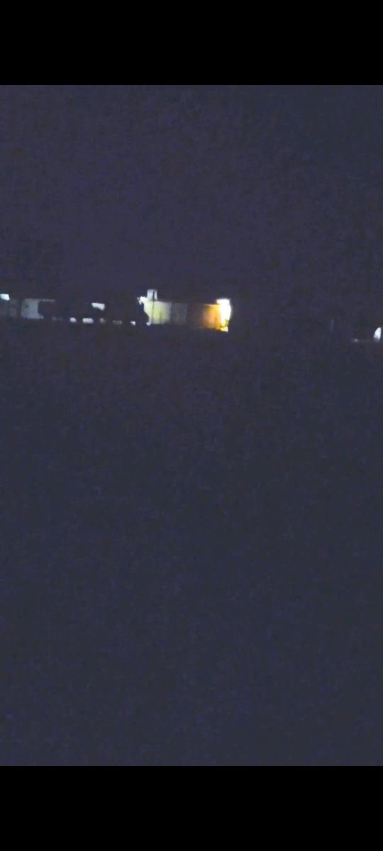 austintaytay420's tweet photo. Here's a video and a still frame of one coming out of a portal by the truck across the street from me around 2-3 in the morning after I was drawing orbs in with military grade lasers. It looked like the Green Goblin from Spider-Man with it's teardrop head shape. It's quick. You can see it moving from the left to right between the van and basketball goal and block out the entire garage lighting you can see it's about 5 feet tall and got a weird head. It first got my attention by some weird whistling noise like it was trying to get my attention. You could feel a strong presence of something. I asked it to show itself to me because I didn't want to seem crazy. And it did.