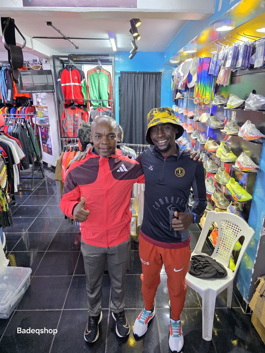 Badeqshop1's tweet photo. Comrades are back in the country. Emmanuel is a 3X finisher(successful).

This time, he brought me a comrade's hat and warmer...not for any other reason, he wants me to Ballot for next year's down run: 100th celebration.

Many thanks for the gifts, Comrade.

I am yet to be sold😄.

He picked the Adidas jacket from our store.. https://t.co/Vs7zAcOSEi