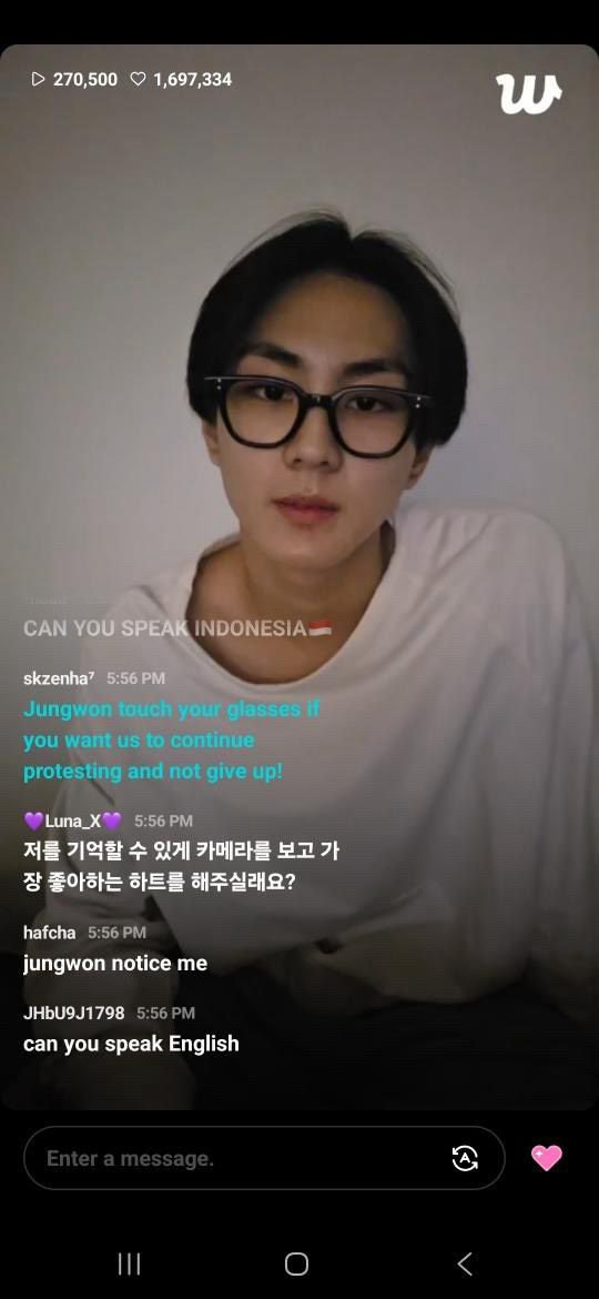 SAktaranis21816's tweet photo. "An ENGENE asked Jungwon on live to touch his glasses if he wanted us to continue protesting &amp; not give up. 
And guess what? He touched his glasses! 😭 
Please guys, don’t give up. We will win. Keep fighting." https://t.co/1V6h4yc3wF