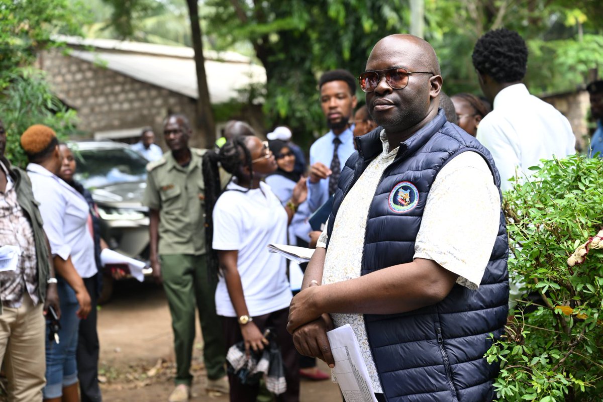 ODPP_KE's tweet photo. 𝐑𝐞𝐭𝐫𝐚𝐜𝐢𝐧𝐠 𝐊𝐞𝐲 𝐋𝐨𝐜𝐚𝐭𝐢𝐨𝐧𝐬 𝐢𝐧 𝐭𝐡𝐞 𝐎𝐧𝐠𝐨𝐢𝐧𝐠 𝐊𝐰𝐚 𝐁𝐢𝐧𝐳𝐚𝐫𝐨 𝐌𝐮𝐫𝐝𝐞𝐫 𝐂𝐚𝐬𝐞

Today, the court, accompanied by parties to the case, including prosecution, investigators, and other stakeholders, conducted a scene visit to various locations within Malindi, an area at the center of one of Kenya's most tragic and complex criminal investigations into the Kwa Binzaro Massacre.

The visit aimed to enable the court to gain a firsthand understanding of the geographical layout and significance of key locations that have featured prominently in witness testimonies and evidence presented during the proceedings.

The first stop was at the Good News International Church (GNI) premise at Furunzi. This is the place where Pastor Paul Mackenzie used to conduct the church services and broadcast his teachings through TimesTv.

The church has featured prominently in the proceedings, with several witnesses testifying about teachings, gatherings, and activities that allegedly took place here before followers relocated to Shakahola.

The team also visited Pastor Mackenzie's homestead, located adjacent to the church. Witness testimony alleged that followers arriving from different parts of the country would be accommodated at the homestead before being transported to Shakahola.

The court then proceeded to several homesteads that the prosecution, through its witnesses, alleges were rented by two of the accused persons, namely Shallyne Anido, alias Ann, and Kahindi Kazungu, alias Mlewa. According to the witnesses, the houses were used to accommodate individuals who were on transit to Kwa Binzaro.

Despite challenging terrain and intermittent rainfall, the court took evidence of witnesses who claimed to have been held at the said houses for between 1 and 2 months before being taken to Kwa Binzaro.p The witness narrated how they were coerced to travel to Kwa Binzaro, where they were told they would fast to death in order to meet God. 

By examining the physical environment and the relationship between the various sites, the court gained additional context to assist in understanding the evidence presented during the trial. 

The chain of events explained by the witnesses and locations visited appears to portray an orchestrated operation by individuals with ulterior motives.
 
Click the link below to access the highlights : 
https://t.co/qEPmQBHnG1

#HakiNaUsawa