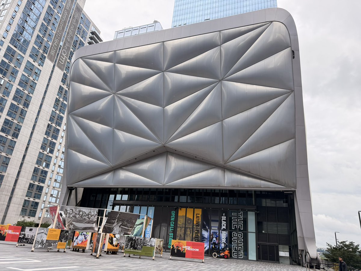MickmickNYC's tweet photo. 🎭🕶️ BLACK MIRROR EXPERIENCE HAS ARRIVED IN NYC

📍 The Shed @TheShedNY 
545 W 30th St, New York, NY

📅 Now through September 6, 2026
⏱️ About 60 minutes
👥 Small groups (up to 6 people)
🎟️ Paid ticketed experience

My husband and I checked it out today. The experience creates an AI-powered avatar using your face and voice, then drops you into a series of immersive VR scenarios inspired by the world of Black Mirror.

🤖 You’ll interact with a digital version of yourself
🎮 Multiple VR environments and challenges
😆 Some genuinely funny moments
🔫 A surprisingly fun action sequence
👨‍👩‍👧 Kids can participate too

💡 Pro Tips:
• Arrive a little early for check-in and avatar creation
• Wear comfortable shoes—you’ll be moving around
• If you wear glasses, they can generally be accommodated with the VR headset
• Go in without spoilers—the less you know, the better

📸 Bonus: Right outside The Shed, you’ll also find the giant pink teddy bear sculpture next to Vessel. It’s hard to miss and makes for a fun photo stop before or after your visit.

🎟️ Tickets: Advance reservations are recommended, especially for weekends. 

More information: https://t.co/ftzPDs5x7C

⭐ My take: My husband loved it. I thought it was an interesting and unique hour, especially if you’re curious about AI, virtual reality, and the kind of technology themes that Black Mirror explores.